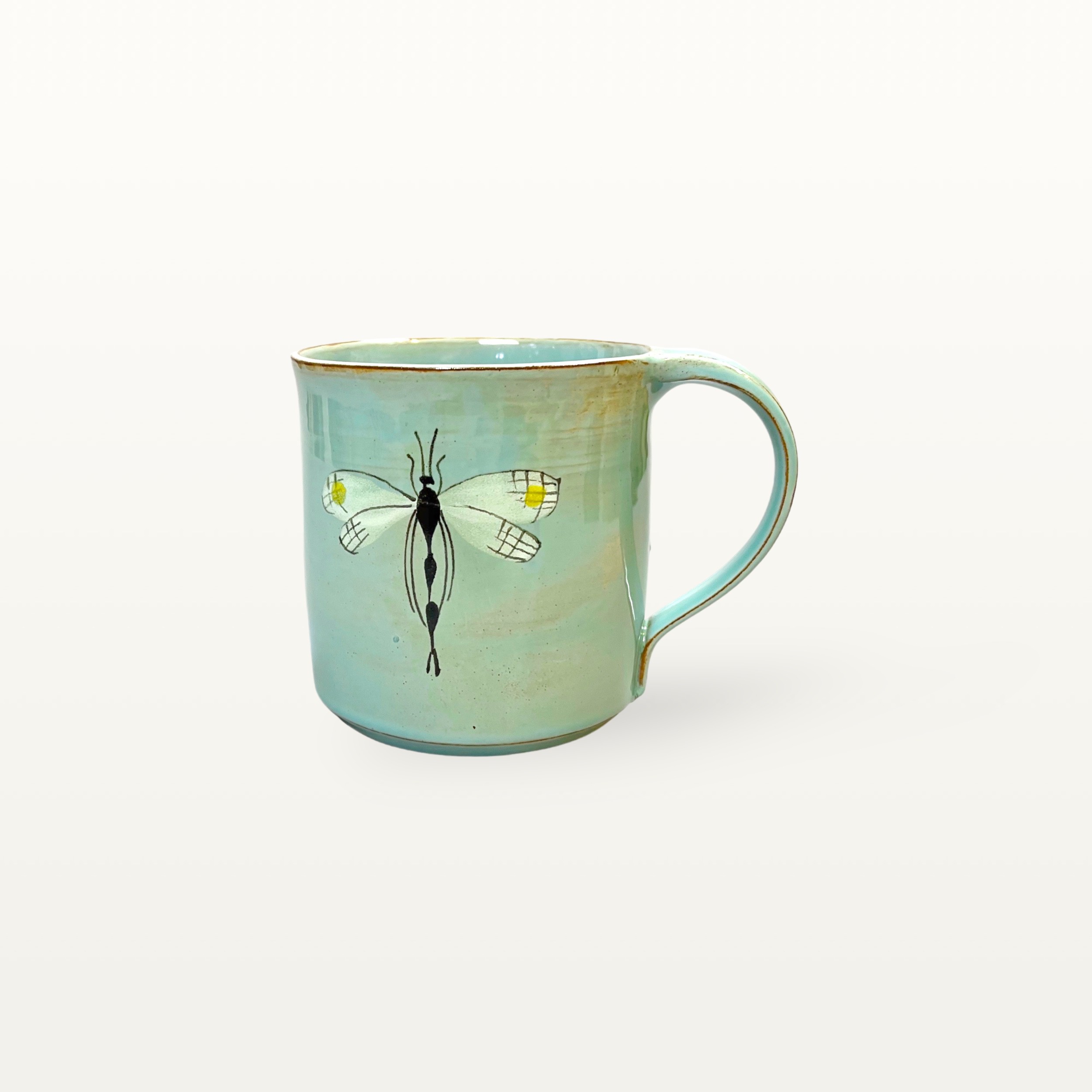 Salbeifarbener Kaffeepott mit Libellenmotiv